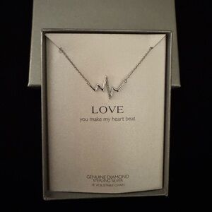 Sterling Silver “Love” Necklace with Small Diamonds. 18” (adjustable to 16”.)